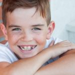 WHEN SHOULD A CHILD FIRST SEE AN ORTHODONTIST